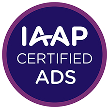 Circular badge logo for International Association of Accessibility Professionals (IAAP) Accessible Document Specialist (ADS) credential. A dark blue circle with three lines of centered white text that read: IAAP Certified ADS. There is a smaller purple circle that surrounds the dark blue inner circle that designates the ADS credential color scheme.